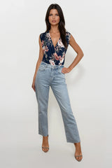 JAY FLORAL NAVY SLEEVELESS WRAP STYLE BODY
