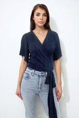 JASMINE NAVY PLISSE WRAP TOP WITH ANGEL SLEEVE