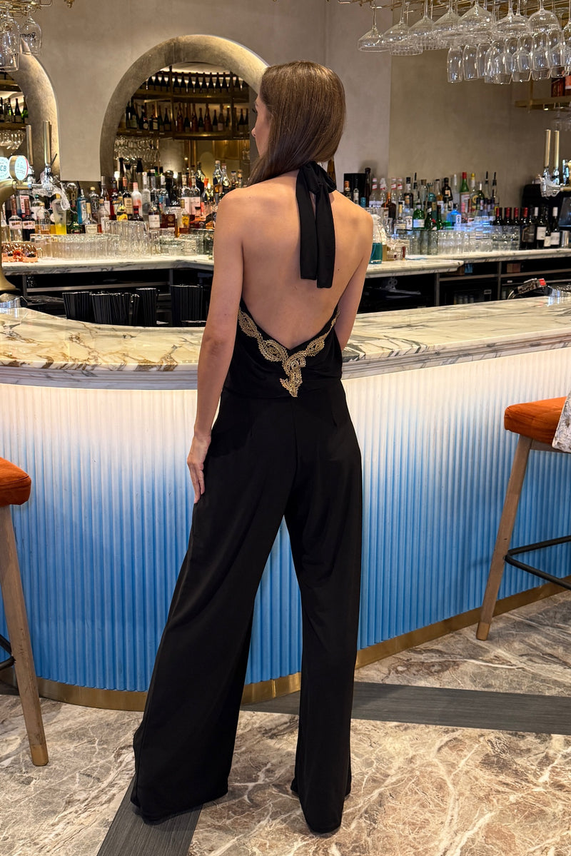 SASHA BLACK BACKLESS JUMPSUIT WITH WIDE LEGS AND GOLD LEAF TRIM
