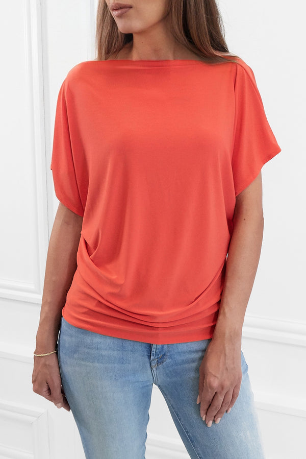 FINLEY ORANGE BATWING TOP WITH SLASHED NECKLINE